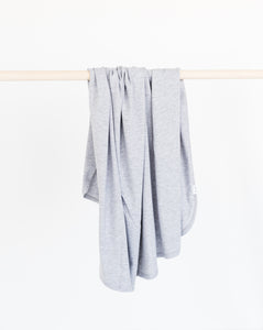 our bamboo stretch swaddle blanket in heathered grey