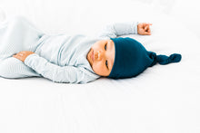 Load image into Gallery viewer, A baby boy wearing our Midnight Teal Knotted Gown in size 0-3 months and our Baby blue Stripe Knotted gown in 0-3 months
