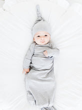 Load image into Gallery viewer, a baby boy wearing our heathered grey top knot hat and heathered grey knotted gown